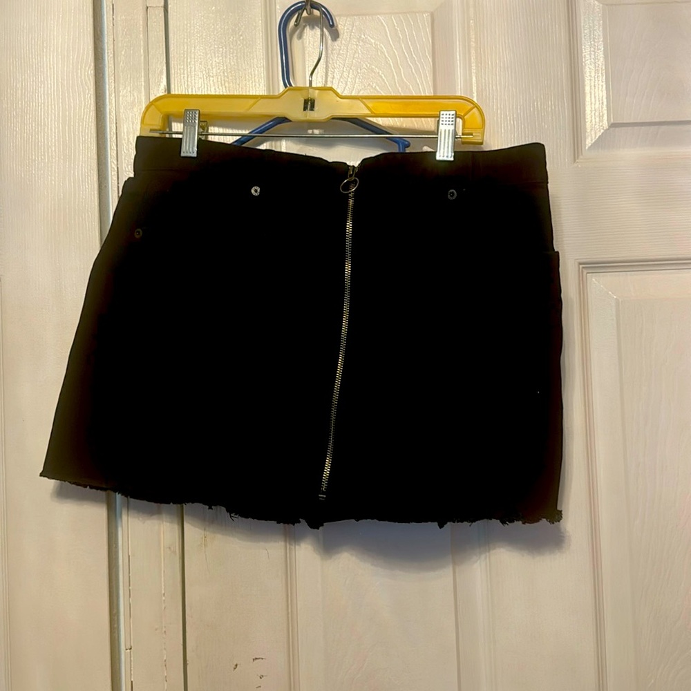 Jean mini skirt black size 12 zipper in the front